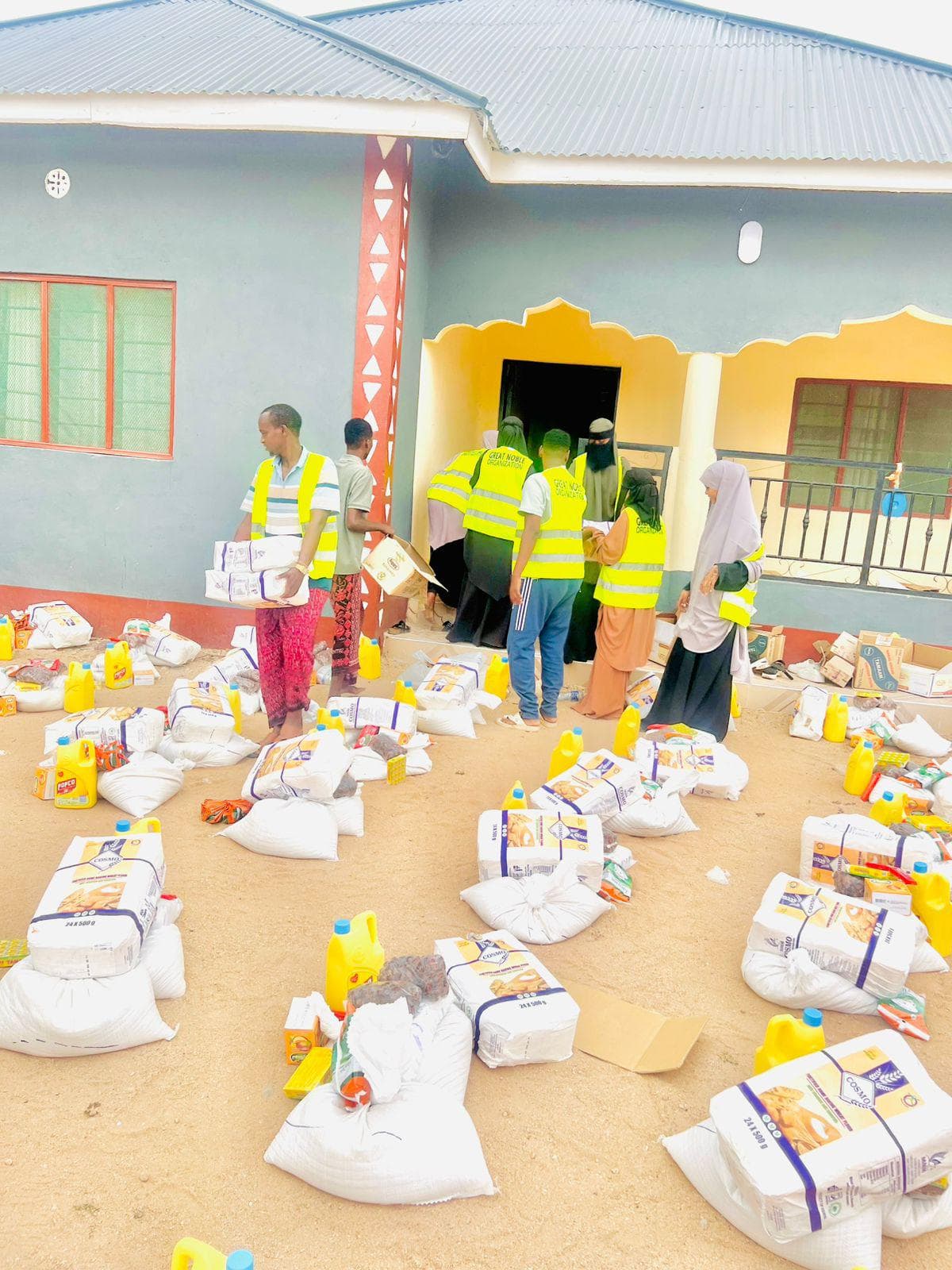 Volunteers handing out food packages